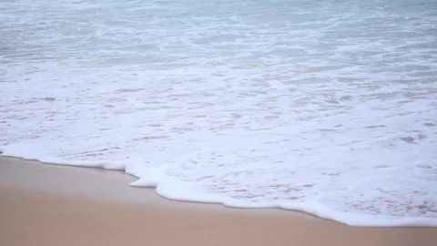 Wave is falling on sand shore in slow motion. 스톡 동영상 71502482