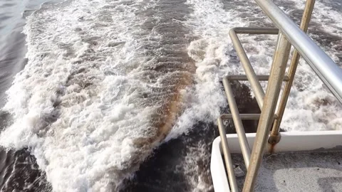 Wave flow from a ship during Daylight (Slow motion) Stock Footage 265584490