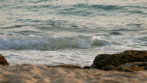 Wave foam bubble of the sea on the beach with rock. tropical summer sea beach. Stock Footage 132559759