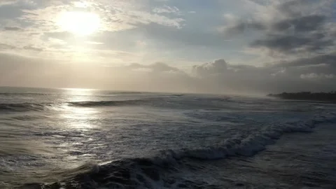 Wave forming drone flying close to the ocean Stock Footage 303629957