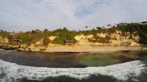Wave in front of Beach and Cliffs in Bali Indonesia 스톡 동영상 52313544