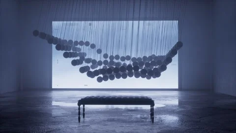 Wave of hanging spheres rippling before a glowing screen Stock Footage 346781427