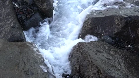 The wave hit the rock at the beach Stock Footage 143176521