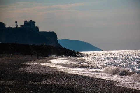 Wave hitting the beach Stock Photos