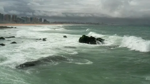 Wave hitting rock in slow motion 3 Stock Footage 127239811