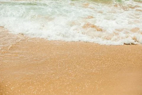 Wave lapping on the shore Stock Photos
