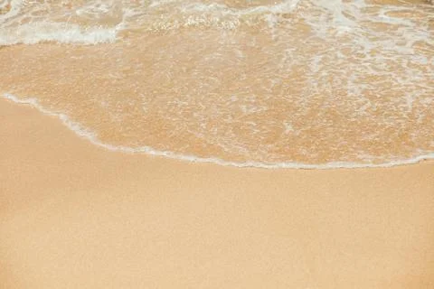 Wave lapping on the shore Stock Photos