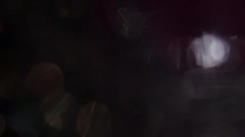 Wave of light of crystal bokeh close up in the blackness Vidéo 317478125