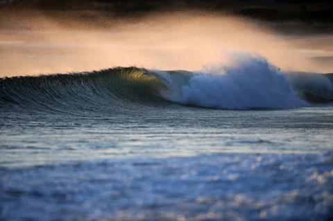Wave in the morning light Stock Photos