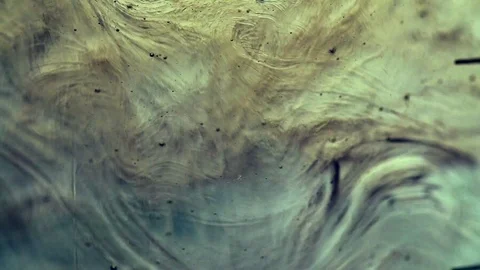 Wave motion of thick viscous fluid or liquid with small bubbles as abstract Stock Footage 102447041