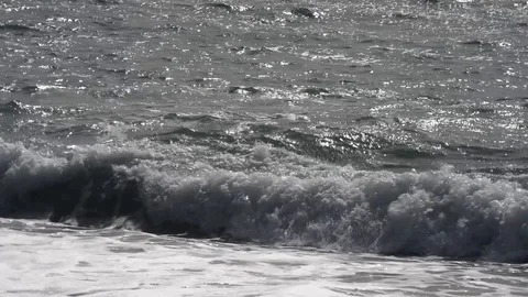 Wave movement of the sea and wave breaking on the beach with strong wind Stock Footage 88631050
