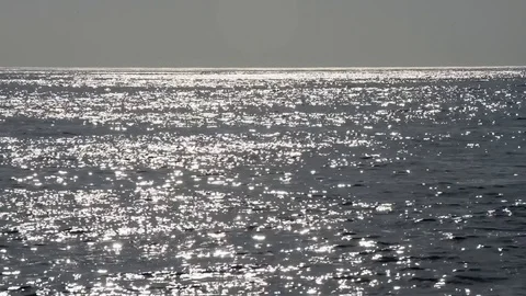 The wave movement of the sea full of reflections of light Stock Footage 84015944