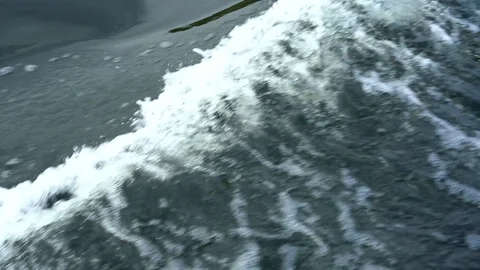 Wave from moving shipboard. Close-up wake splashes Video stock 96278816
