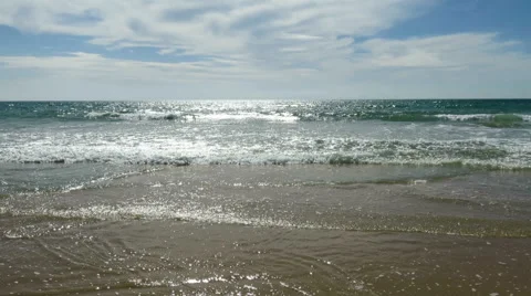 Wave from ocean to feet Stock Footage 58266581