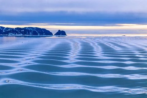 Wave pattern on the Arctic Ocean at the coast of Svalbard Wave pattern on ... Stock Photos