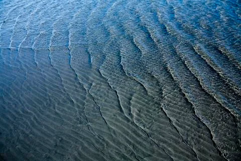 Wave pattern on sandy soil and waves Foto stock