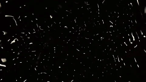 Wave patterns resembling subatomic particles pulse in a black void. Stock Footage 144492369