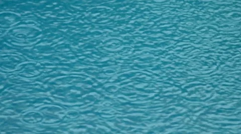 Wave of rain drop in swimming pool Stock Footage 53083111