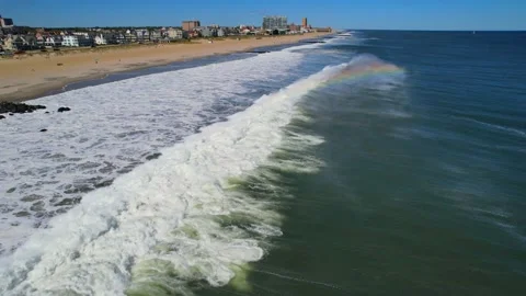 A Wave with Rainbow Spray 4K Stock Footage 214376422