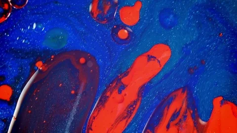 Wave of red washes over blue 2 vibrant bright paint and oil color swirls entropy Stock Footage 81942676