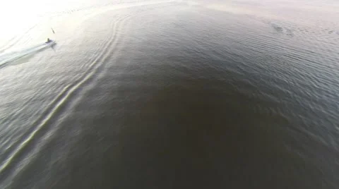 Wave riding at sunset Video stock 50447099