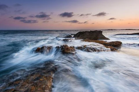 Wave on rock Stock Photos
