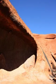 Wave rock at Uluru Ayers Rock under blue sky Stock Photos