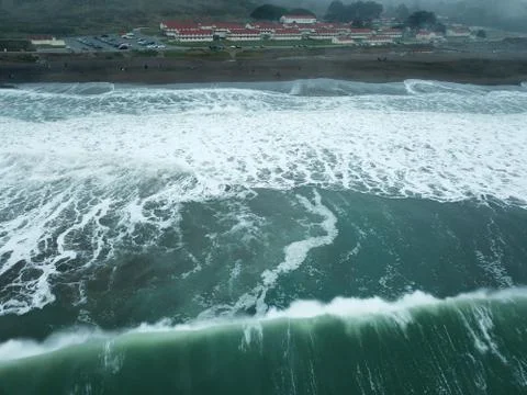 Wave rolling into Rodeo Beach Stock Photos