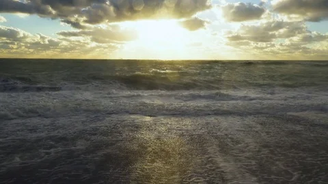 The wave rolls and strikes against the pebble beach Stock-Footage 81970212