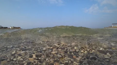 The wave rolls on camera Stock Footage 97535273