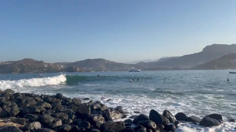 Wave rolls by Rocks HD Stock Footage 175969698