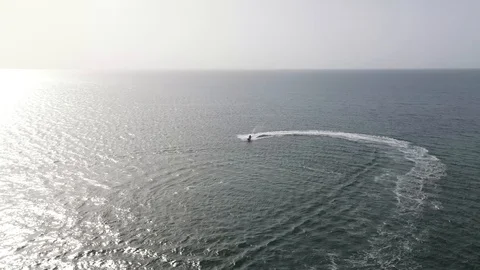 Wave Runner Caribbean Ocean Reef Sunset Drone Shot 4K Stock Footage 114848914