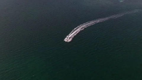 Wave Runner On Caribbean Ocean Tracking  Aerial Shot 4K Stock Footage 114857986