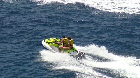 Wave runners sailing along the north coast of Benidorm in Spain. Stock Footage 113533164