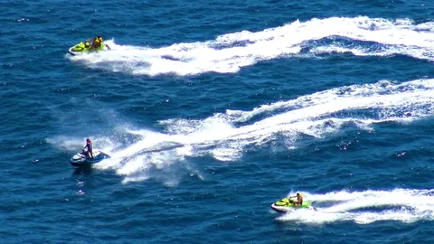 Wave runners sailing along the north coast of Benidorm in Spain. Stock Footage 113886457