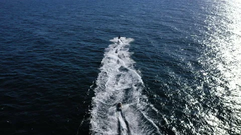 Wave runners sailing along the north coast of Benidorm in Spain. Stock Footage 139938173