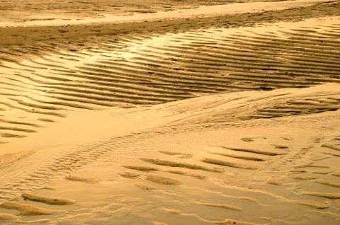 Wave sand on the beach Fotos de archivo