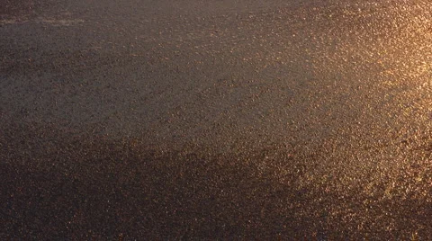 Wave on sand at sunset Vidéo 2812433