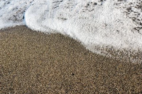 Wave on sand, wave on a beach top view, horizontal Stock Photos