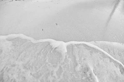 Wave On Sandy Beach. Background. Splash of waves on the sandy beach. foam, su Stock Photos