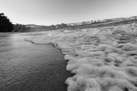 Wave On Sandy Beach. Background. Splash of waves on the sandy beach. foam, su Stock Photos