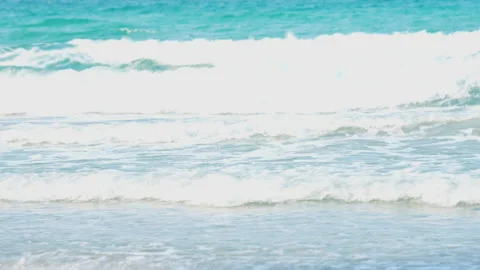 Wave sea on beach of slow motion on summer of sunny background Vídeo Stock 238740914