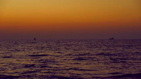 Wave sea beach on sunset sky background Video stock 140810808