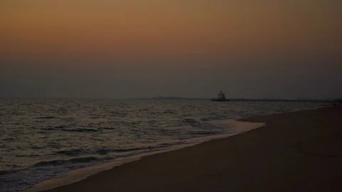 Wave sea beach on sunset sky background 動画素材 140865795