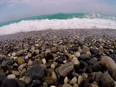 The wave of the sea covers the video camera, Slowmotion 動画素材 76841962