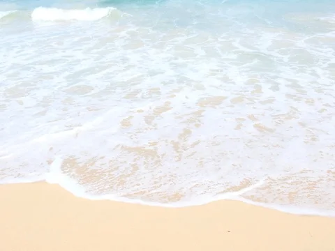 Wave of the sea on the sand beach Видео 77115211