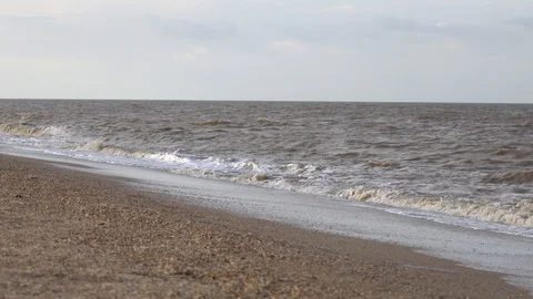 Wave of the sea on the sandy beach Stock Footage 98679402