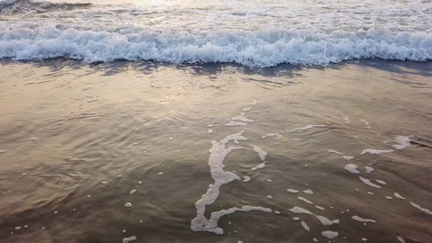 Wave of the sea on the sandy beach Stock Footage 128837914