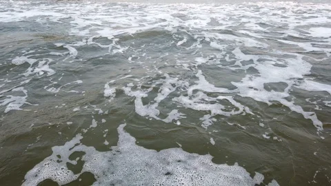 Wave of the sea on the sandy beach Stock Footage 128843250