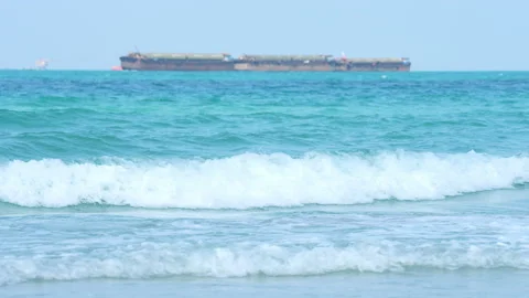 Wave sea slow motion on sand of beach on summer season Video stock 237337116
